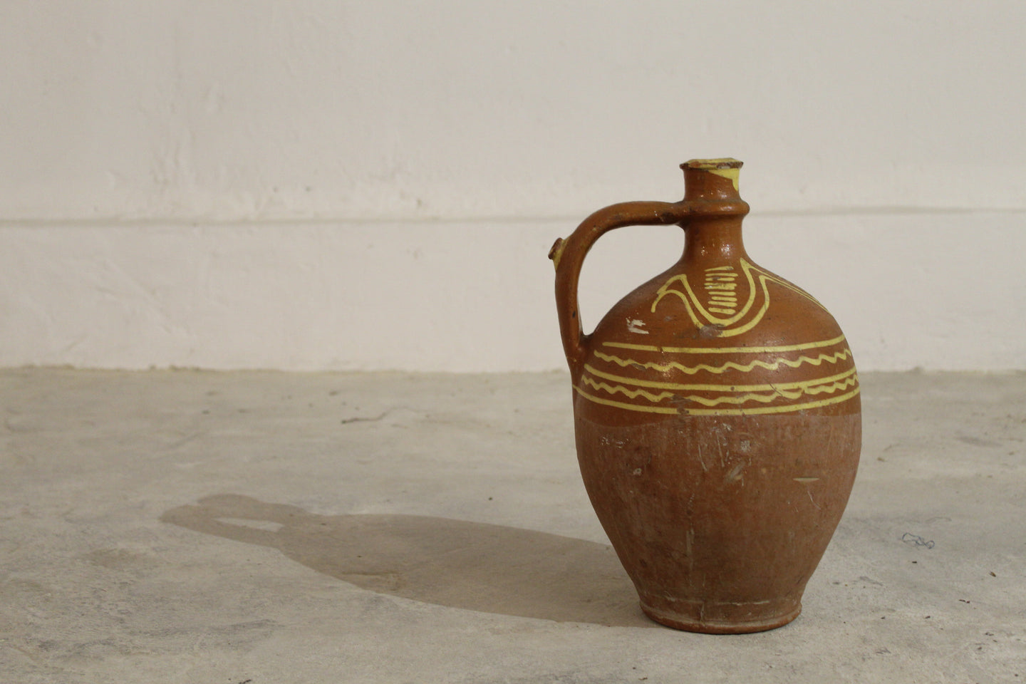 TERRACOTTA WATER JUG WITH YELLOW DETAILS